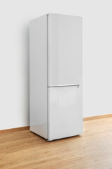 White fridge on white wall background