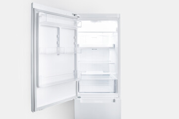 Empty open fridge interior