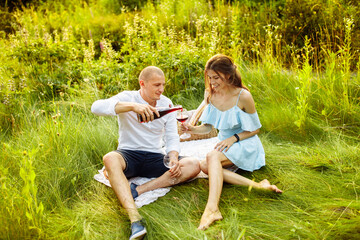Loving couple having a picnic at the park