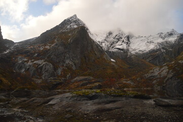 Colorful autumn refelctions and colors in the mountains on the beautiful fjords of Lofoten in Norway