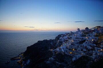 Beautiful town of Santorini island at twilight, sunset time, Oia, Greece, Europe