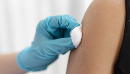 Doctor vaccinated against new strains of the virus for the patient to build immunity.