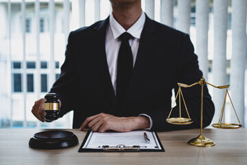 Lawyer in a black suit is currently investigating in the courtroom.