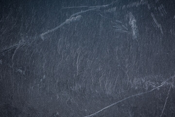 Dark grey and black slate background or texture