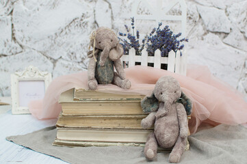 two toy elephant in vintage style.For postcards, posters for happy birthday, holiday, valentine's day.Copy space.