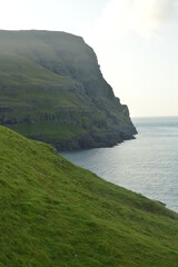 The dramatic and mystical landscapes on the coast and mountains of the Faroe Islands