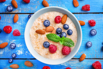 Healthy homemade oatmeal with berries for breakfast