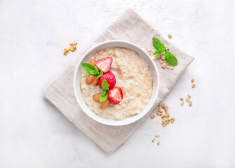 Healthy homemade oatmeal with berries for breakfast