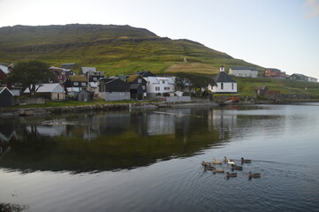 Fototapeta na wymiar The dramatic and charming nature and mountains on the Faroe Islands