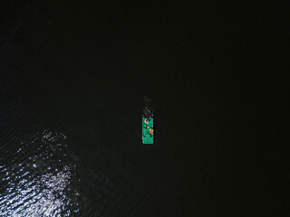 Aerial top view. Catamaran on the water.