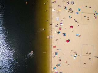 Fototapeta na wymiar Aerial view. City sandy beach in summer in Kiev.