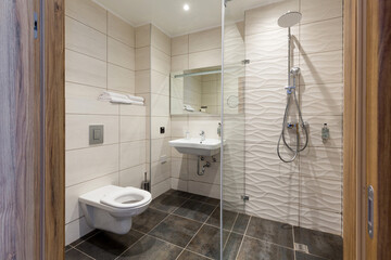Interior of a hotel bathroom interior with shower cabin