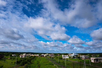 long view of modern buildings & Nature