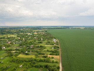 Aerial drone view. Agricultural fields near a village in Ukraine.