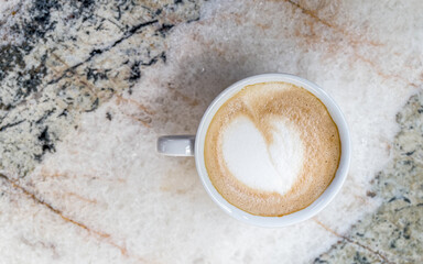 Italian cappuccino coffee cup on marble table surface