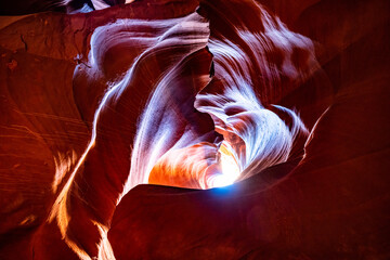 Heart shaped Canyon. Sunlight shinning on Upper Antelope Canyon makes colorful canyon from red through purple.  