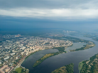 Aerial view of the Dnieper River and the city of Kiev from above. Summer sunny day.