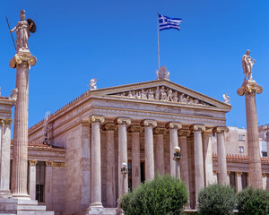 Fototapeta na wymiar Athens Greece, the national academy lassical building white marble facadewith Athena and Apollo statues