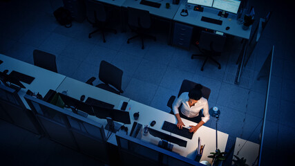 Alone Working Late at Night in the Office: Businesswoman Using Desktop Computer, Analyzing, Using...