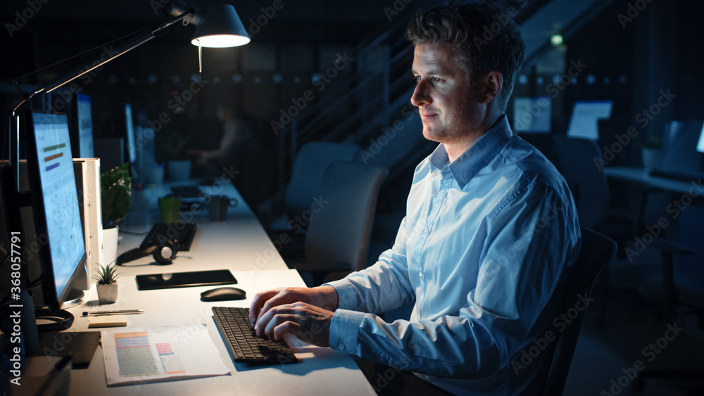 Aufkleber portrait of ambitious and confident businessman uses desktop computer, typing on a keyboard, monitor