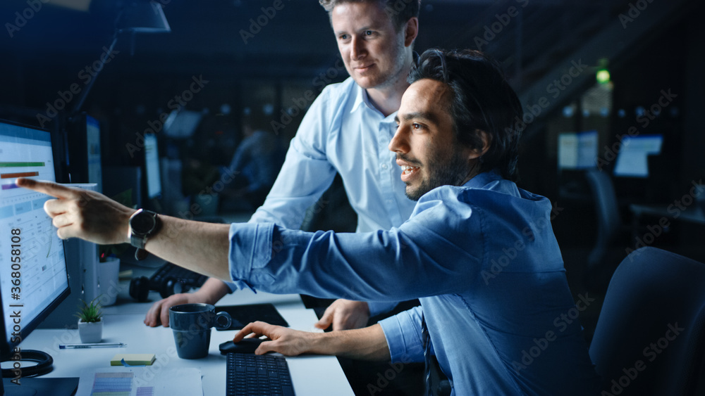 Aufkleber ambitious and confident businessman uses desktop computer, his project manager explains specific tas