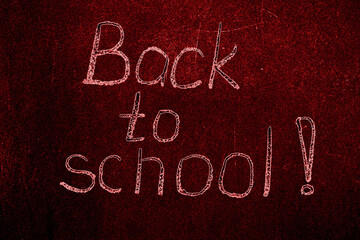 Fototapeta premium Back to school lettering on a red background. Approaching the next school year after the period of the pandemic