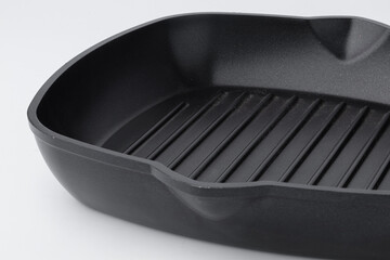 New ceramic non stick frying pan on white background