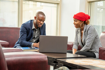 two business colleagues in a small business meeting