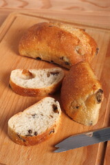 Ciabatta with black olives. Italian white bread.