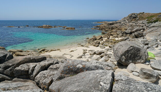 Beach with sand and rocks on the coast of Galicia, Spain, Atlantic ocean, Bueu, province of Pontevedra, Praia de Lagos