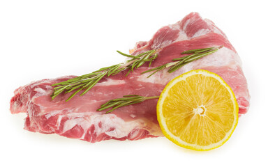 Raw pork ribs with rosemary and lemon on a white background isolate