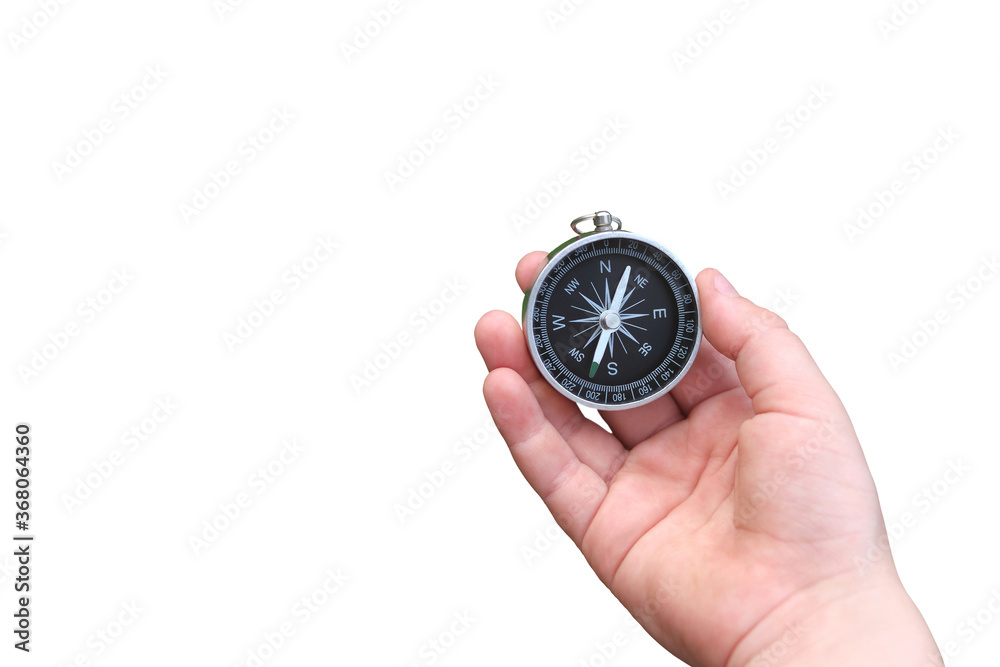 Wall mural round compass in hand isolated on white background for abstract image with place for text as symbol 