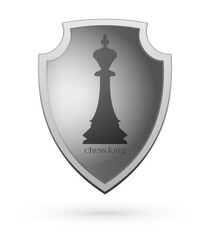The image of a chess king on a shield. Chess concept design. Vector illustration