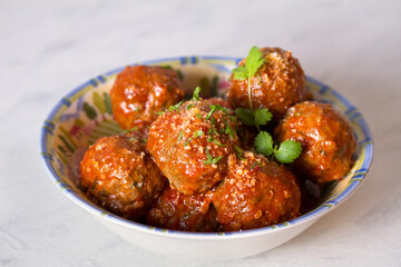 Meatballs with tomato sauce and cheese. horizontal photo