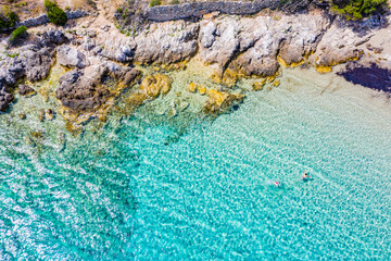 View of beautiful bay with blue turqoiuse sea on Mediterranean coast. Sailing destination. Summer vacation nackground with copy space. Vis island, Milna bay, Zaglav sandy beach. Seascape, cloudy sky