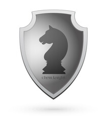 The image of a chess knight on a shield. Chess concept design. Vector illustration