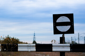 Prohibition of passage. The sign passage is forbidden, there is no entrance. Fence. A sign on the railway tracks - there is no passage.