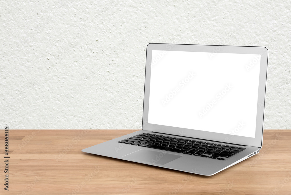 Fototapete smart modern laptop with blank white screen on wooden table and modern white wall in background.eleg