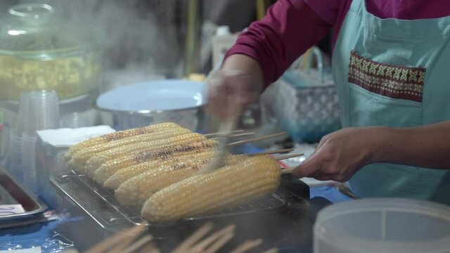 Grilled corn on the cob at night market in Chiang Mai, Thailand