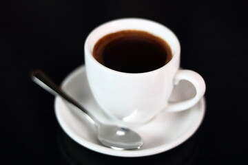 Coffee Cup at black background