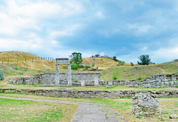 View of ancient columns and stones on the hills