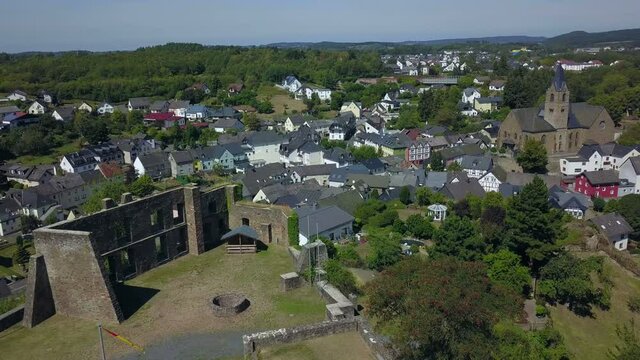 Ulmen (Ulmener) Maar with Parish Church of St. Matthew, Ulmen, Eifel, Rhineland-Palatinate, Germany