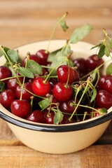 Ripe red cherries in a bowl macro