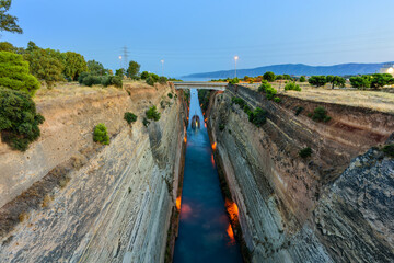 The Corinth Canal at evening.The Corinth Canal connects the Gulf of Corinth with the Saronic Gulf...