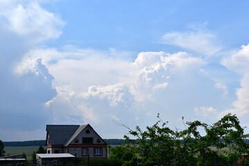 Storm clouds and buildings around the scenery in the summer