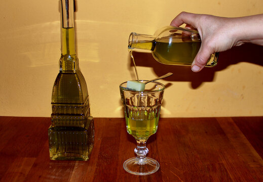beautiful bottle of absinthe with the shape of the Mole Antonelliana, a symbol of Turin, Italy.