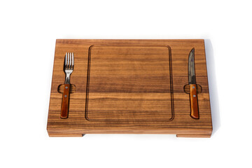 Wooden board for steaks.Wooden plate with a fork and a knife . Wooden tray with notch for fork and knife. Serving a table steak dish. Burger boar on a white background. Isolated board - ready to eat.