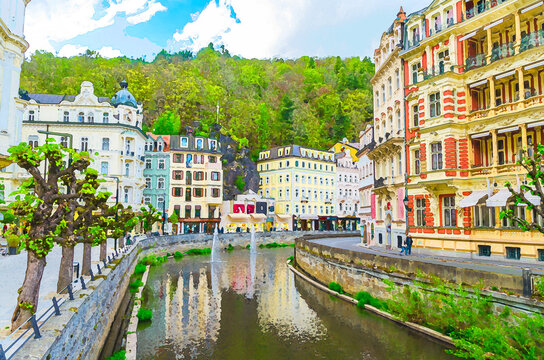 Watercolor drawing of Karlovy Vary, Czech Republic, people are walking down street and Tepla river embankment in historical city centre with colorful traditional buildings, West Bohemia