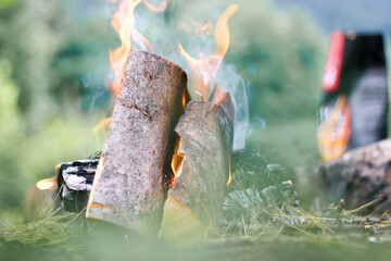 fire ignited in nature under controlled conditions small flame high heat