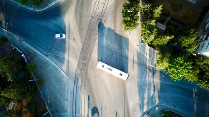 Aerial view of the crosswalk and road junction at the sunset. 